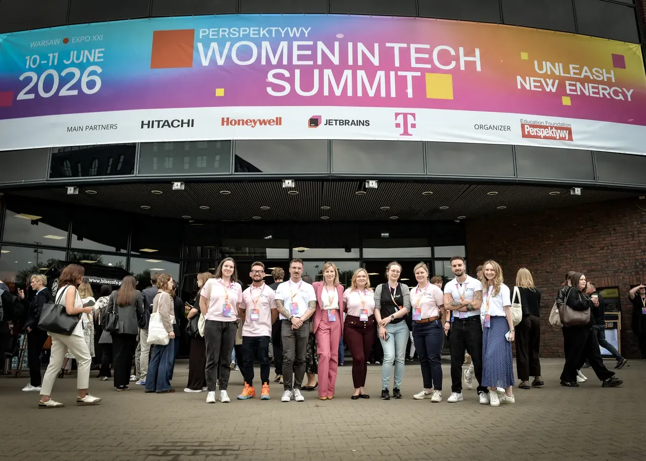 Speakers and volunteers outside the Women in Tech Summit at Expo XXI, Warsaw