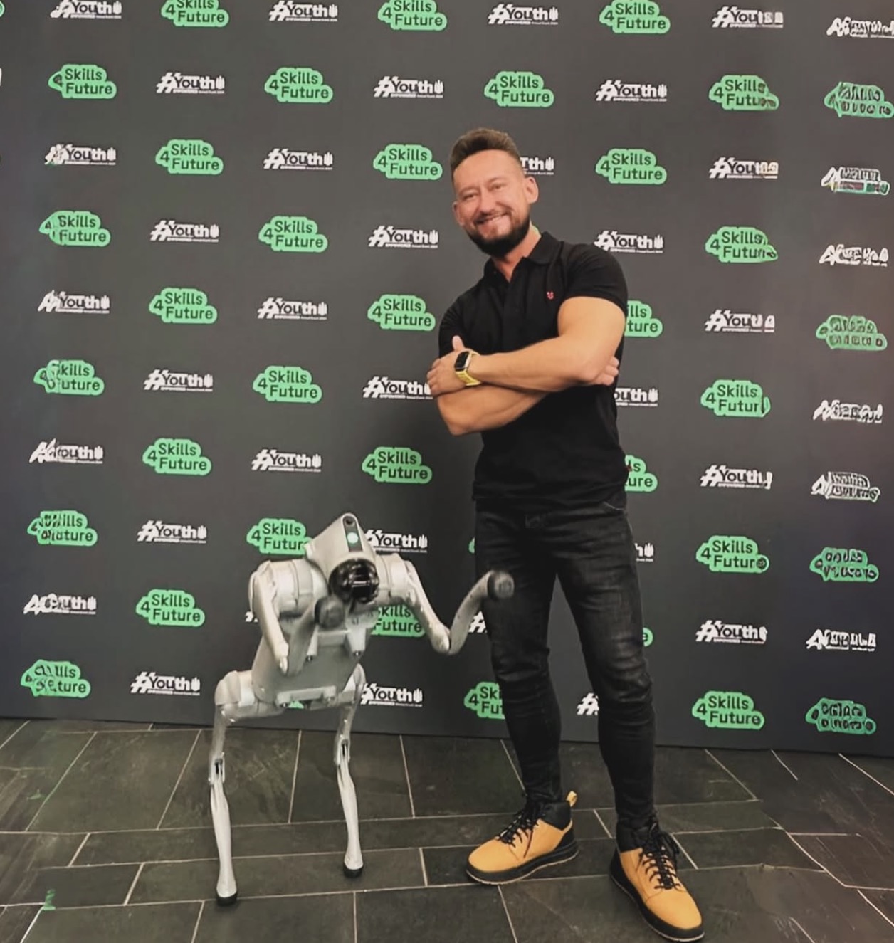 Jorge with quadruped robot at Skills4Future Coca-Cola event